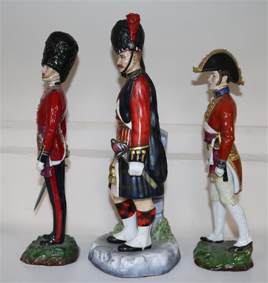 Three soldier figures